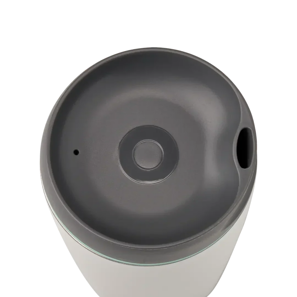 Owala SmoothSip 12oz in white body with gray lid and mint green accent ring, top view